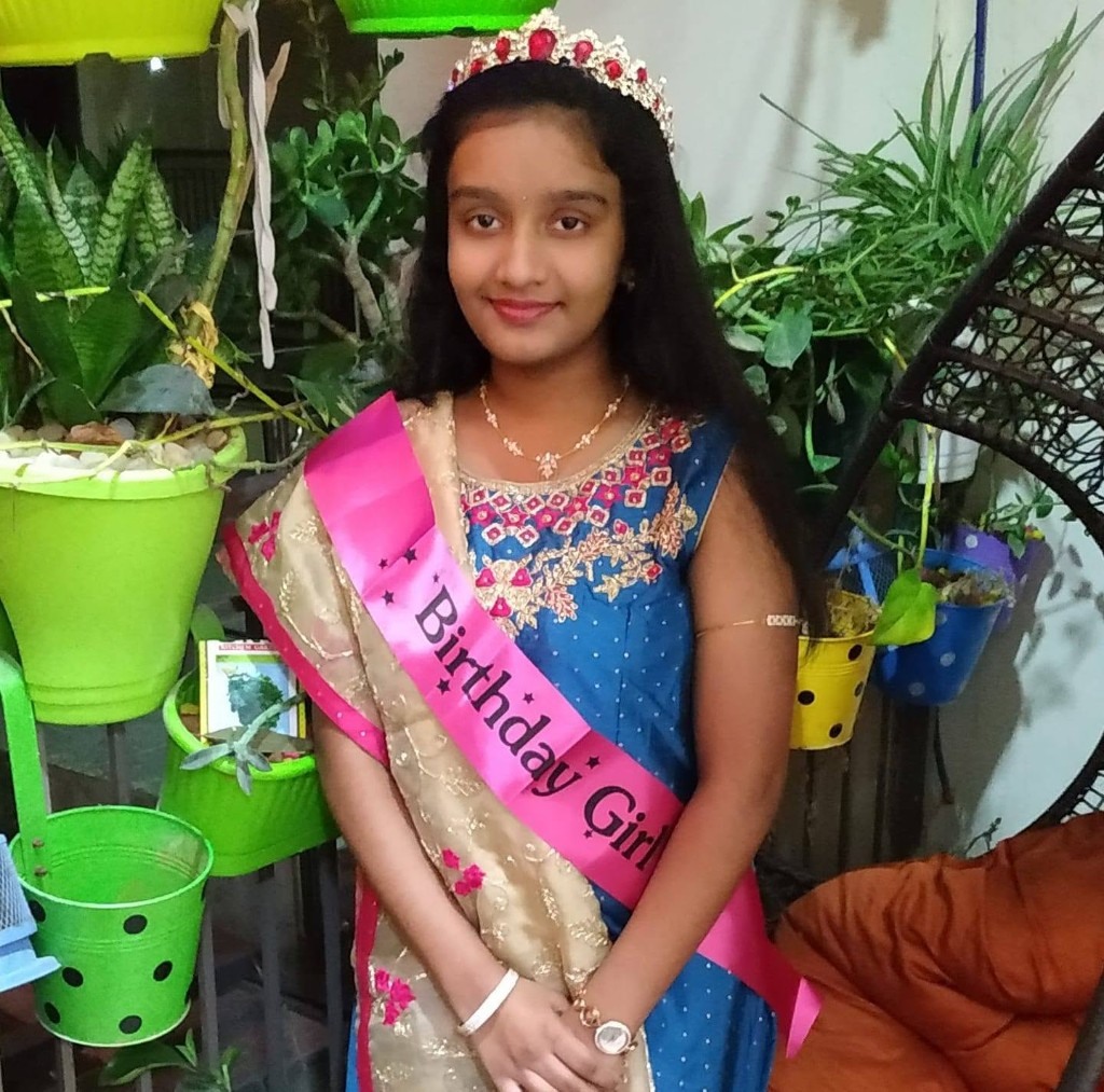 Veda Manchana — Birthday Girl in royal blue attire